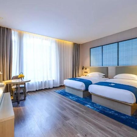 Echarm Hotel Ji'Nan Railway Station Jinan Exterior foto